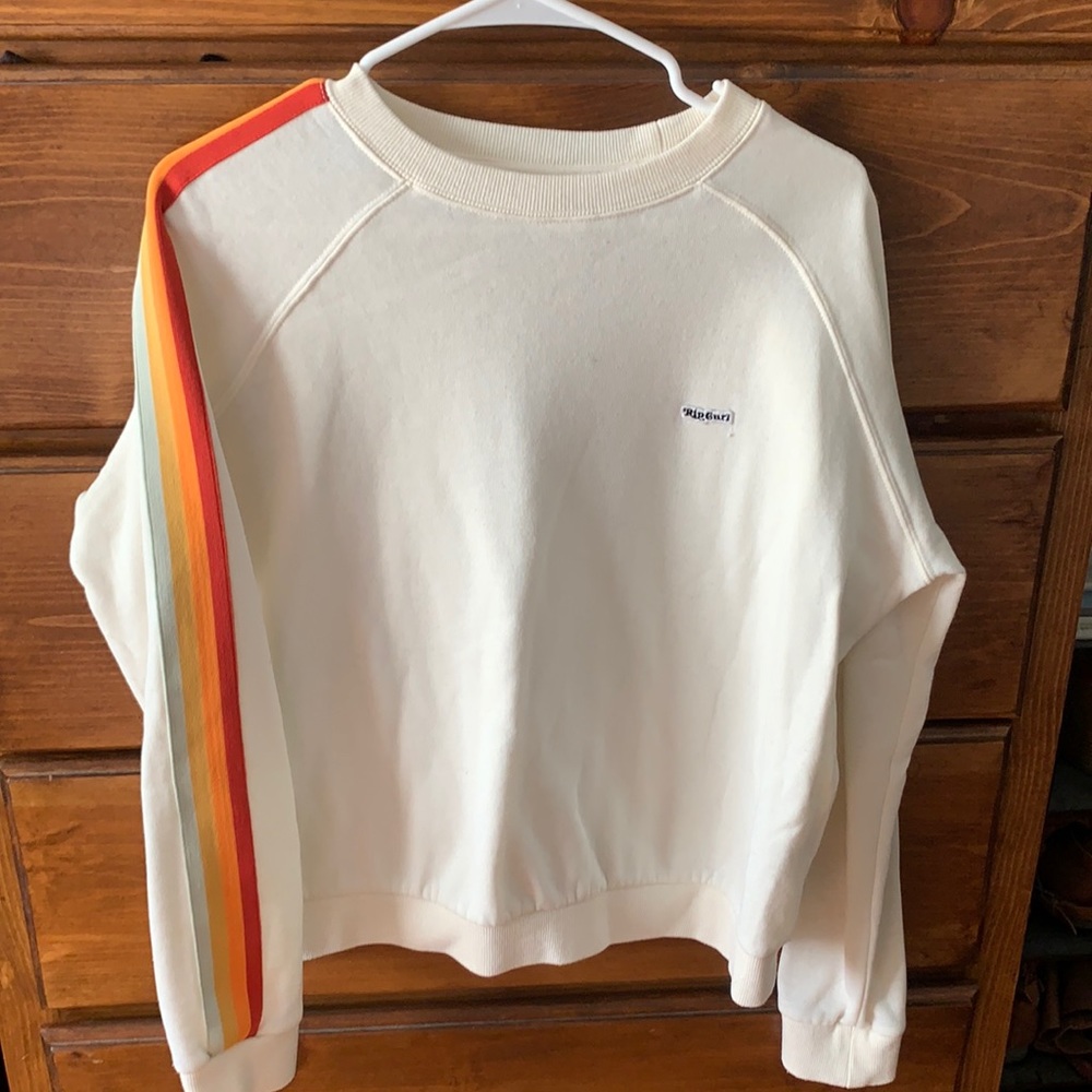 white rip curl crew neck with rainbow on sleeves